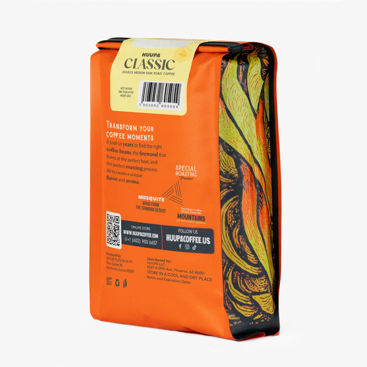 Orange coffee bag with colorful design and 'Huppa' branding on a white background