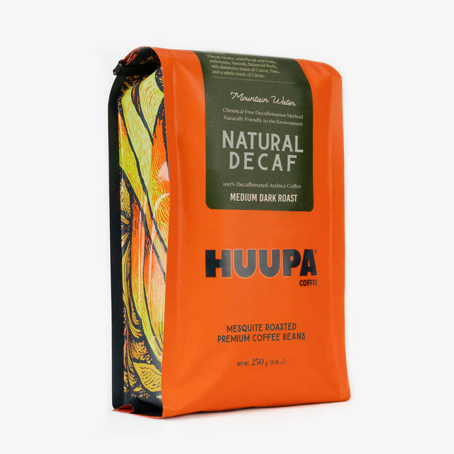 Natural decaf coffee bag with 'HUUPA Coffee' branding on a white background.