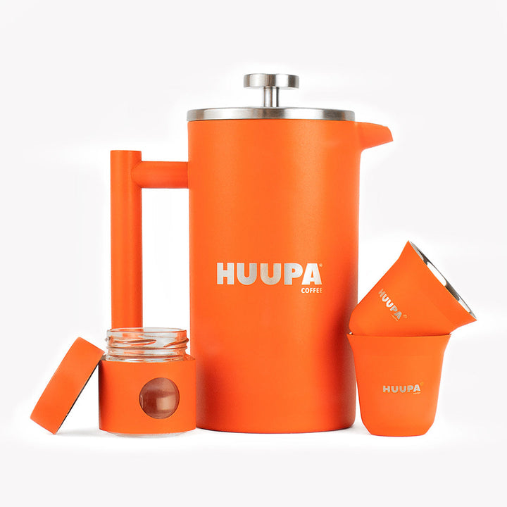 Orange coffee press and accessories with 'HUUPA' branding on a white background