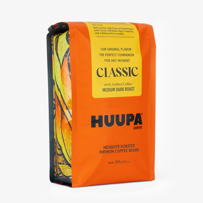 Orange coffee bag with 'HUUPA Coffee' branding on a white background