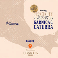A beige map-style graphic labeled “México” with a highlighted location at Oaxaca, featuring printed branding and product text for Huupa Specialty Enigne Garnica & Caturra, including a gold limited edition seal and the Candelaria Loxicha Oaxaca name.