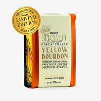 A package of Huupa Specialty Coffee Yellow Bourbon Medium Roast, featuring a cream-colored label with orange side borders and a gold 'Limited Edition' seal on the top left, set against a plain white background.